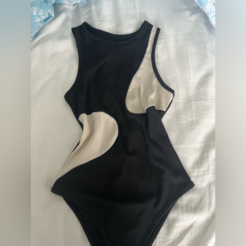 Black and white body suit